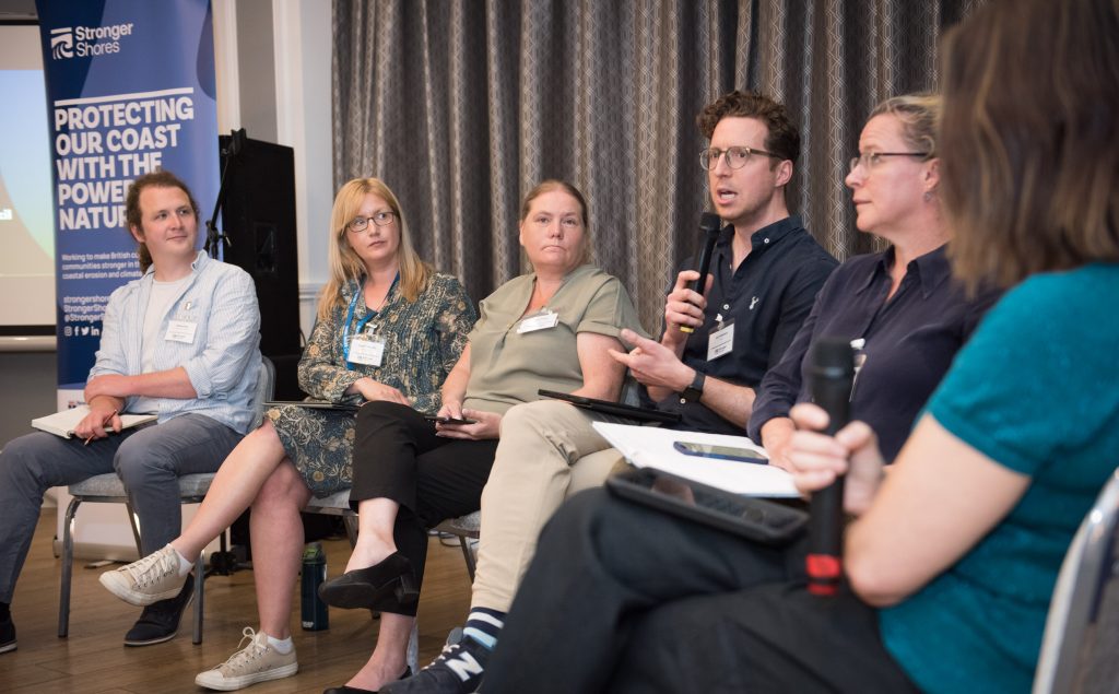 A panel of experts discuss the conference theme at the Stronger Shores Conference 2025
